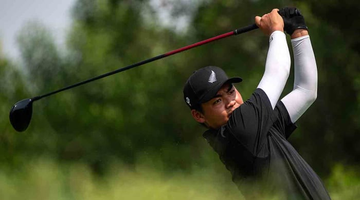 Kazuma Kobori of New Zealand tees off at the third hole during the 2023 World Amateur Team Championships - Eisenhower Trophy at Abu Dhabi Golf Club in Abu Dhabi, United Arab Emirates.